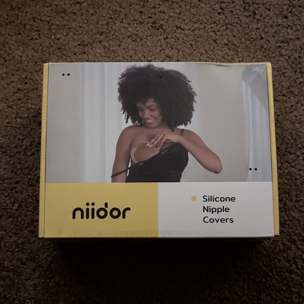 Niidor Silicone Nipple Covers New in sealed packaging.